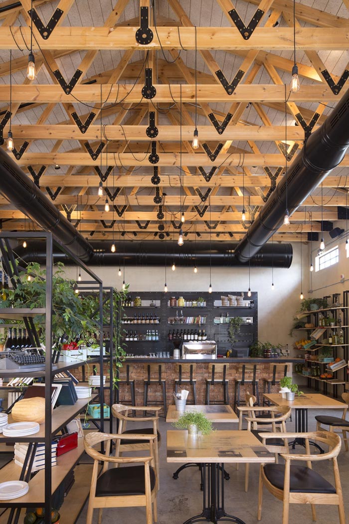 文獻(xiàn)主題餐廳前臺(tái)休息區(qū)域裝修設(shè)計(jì)效果圖